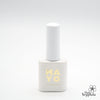 Elegant, minimalist nail polish bottle with a chic gold-colored MAYO logo, showcasing the brand's sophisticated and premium aesthetic.