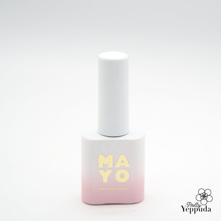 A bottle of MAYO Eros Collection nail polish in a soft pink and white gradient color, showcasing the brand's elegant and romantic aesthetic.