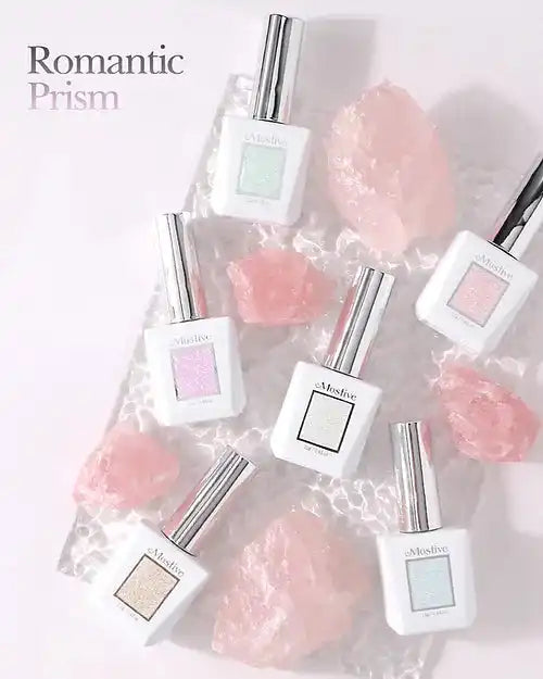 Description of the product image: The image shows a collection of Mostive Romantic Prism gel nail polish bottles in various pastel shades, surrounded by soft pink floral elements. The bottles are displayed against a plain white background, highlighting the sleek and minimalist design of the Mostive brand.