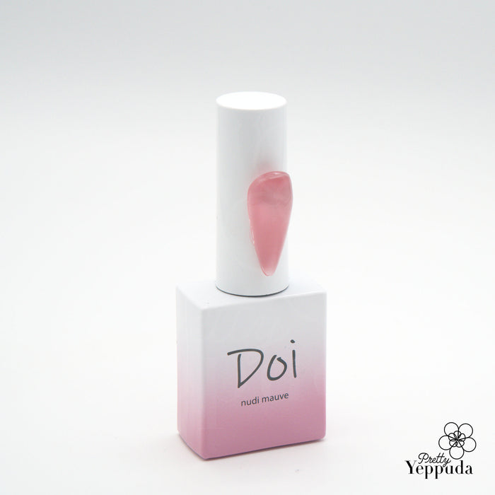 A visually appealing 10ml bottle of Nailbayo's Doi Nudi gel in the mauve color, featuring a sleek and minimalist design with a pink gradient. The product is described as a buildable syrup-like gel with excellent self-leveling properties, making it suitable for both professional and beginner nail artists to create beautiful nail designs.