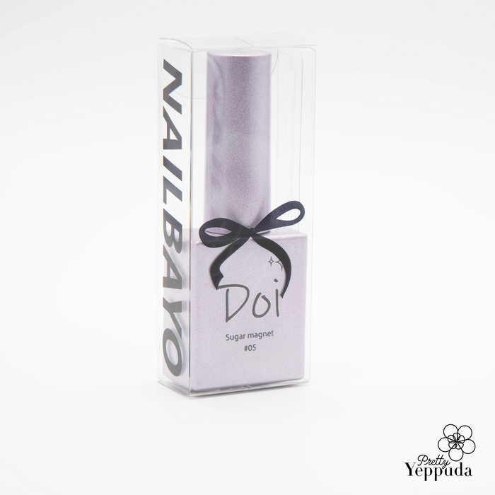 Elegant white box containing Nailbayo DOI Sugar Magnet Gel, featuring sleek packaging with black ribbon and 'DOI' branding. Korean nail art product for creating magnetic effects, part of a 6-piece collection. Professional-grade gel polish requires magnet stick for application.