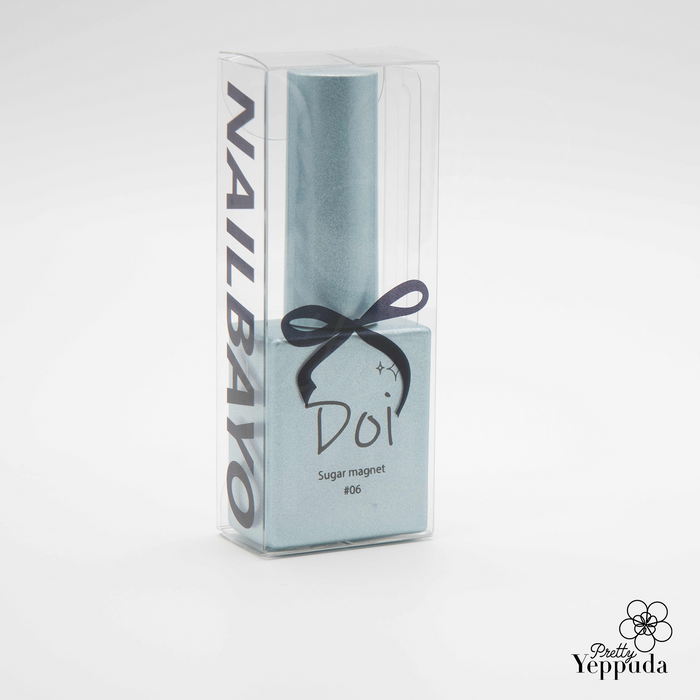 Elegant light blue Nailbayo DOI Sugar Magnet Gel bottle in clear packaging, featuring a black ribbon and stylish branding. Korean nail supply product for creating magnetic nail art effects, part of a 6-piece collection designed by a famous Korean nail artist.