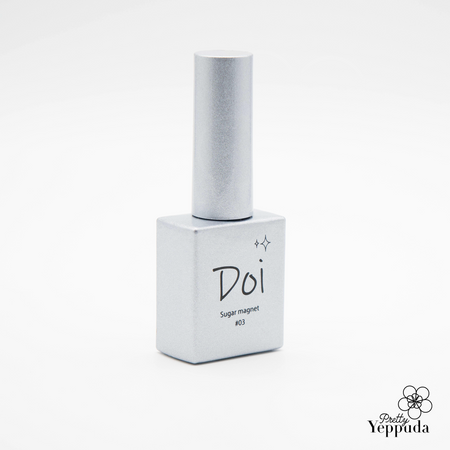 Single bottle of Nailbayo DOI Sugar Magnet Gel in sleek white packaging with silver cap. Rectangular bottle features minimalist design with 'DOI' and 'Sugar magnet' text. Part of Korean nail artist collection, requires magnet stick for application. Professional-grade nail product for creating unique magnetic effects.