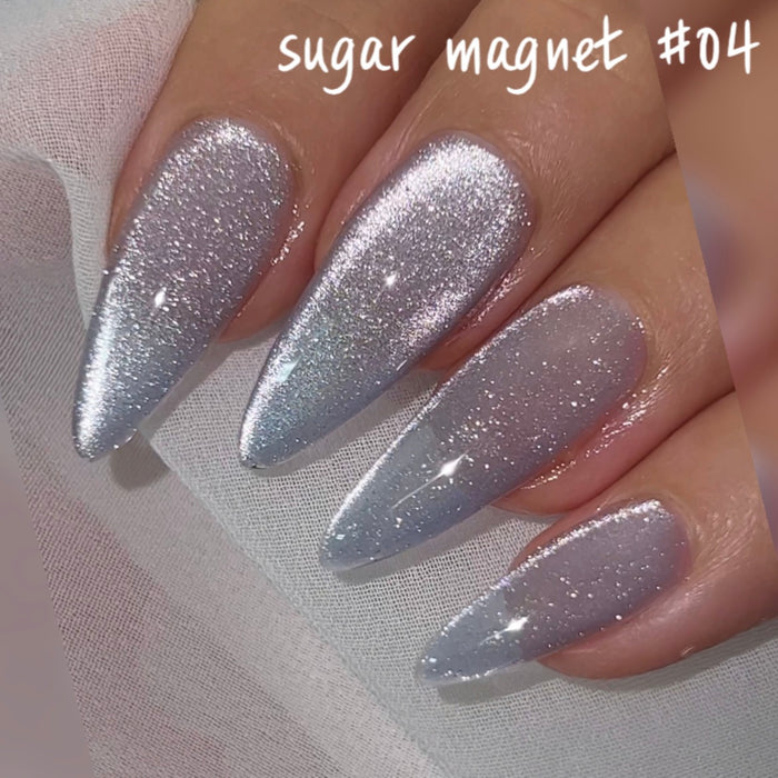 Elegant silver glitter nail polish in the Nailbayo DOI Sugar Magnet Gel Collection, showcasing the captivating and sophisticated design of this Korean nail care brand. The shimmering, magnetic finish requires a specialized tool to create the unique patterns, elevating the user's nail art experience.