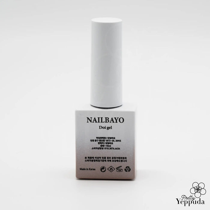 Elegant NAILBAYO Doi Nudi Gel Copper nail polish bottle in 10ml size, featuring a buildable syrup-like formula with excellent self-leveling properties, making it suitable for both professional and beginner nail artists. The product description highlights its versatility as a perfect base color for any design.