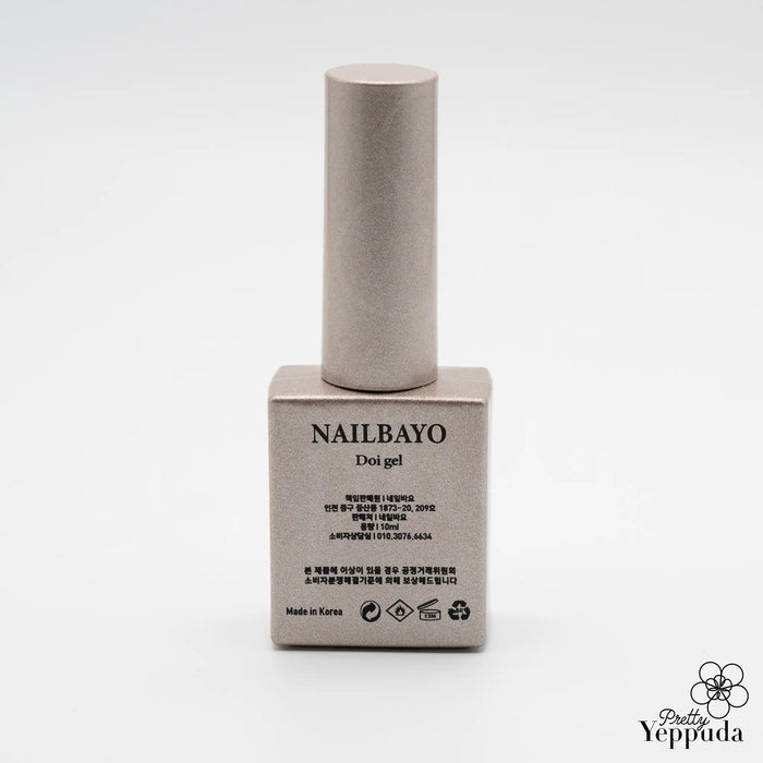 A captivating 10ml bottle of NAILBAYO DOI Magnet Gel #4, a premium Korean nail care product designed by the renowned artist NAILBAYO. This specialized gel requires a Magnet Stick to achieve mesmerizing, magnetic nail designs, making it a must-have for nail enthusiasts and professionals alike. The elegant packaging features the NAILBAYO brand, showcasing the dedication to quality and innovation in the Korean nail supply industry.