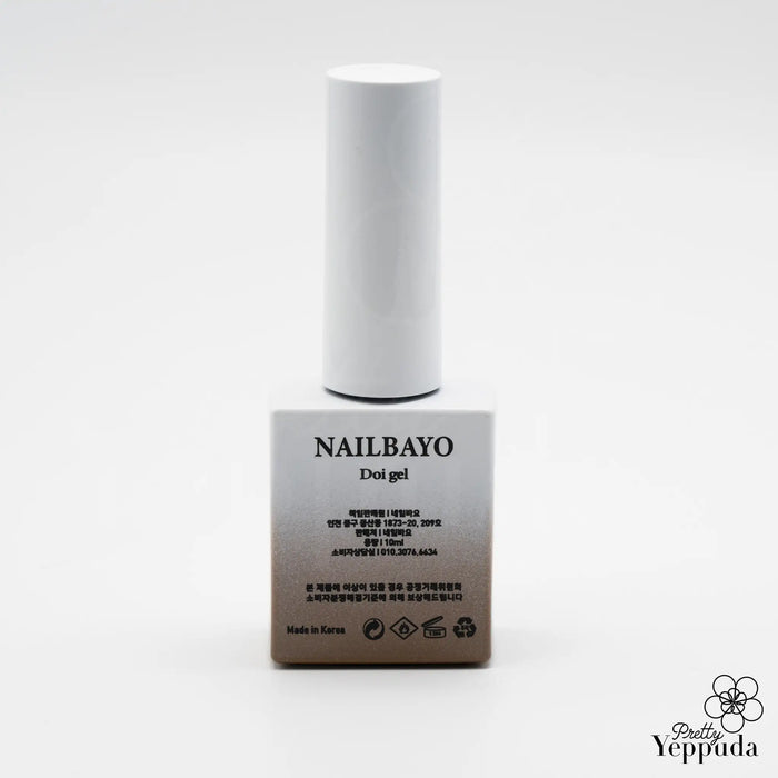 A buildable syrup-like gel polish in a warm, earthy Sepia tone, the NAILBAYO DOI Nudi Gel Sepia - 10ml provides an excellent self-leveling base for any nail design. Suitable for both professionals and beginners, this Korean nail supply product offers superior application and coverage for a flawless, salon-quality manicure.