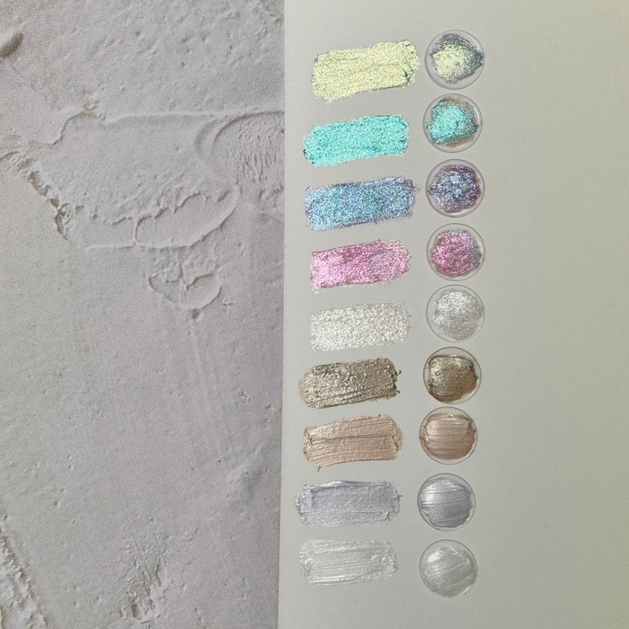 The image shows various swatches of different colored and textured nail art gels, putties, and powders, showcasing the variety of products available in the RIPOSO Sandy Mood collection. The alt text for this image could be: "Assortment of RIPOSO Sandy Mood Putty Gel and nail art products in various colors and textures, highlighting the diverse range of options for creative nail designs.