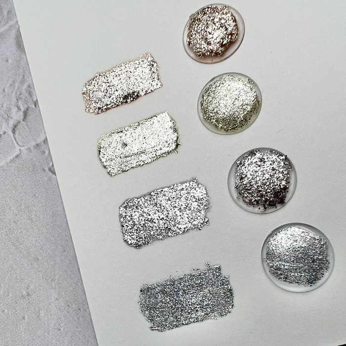 RIPOSO Sandy Mood Putty Gel (2 types) - Assorted silver and gray sparkle nail art gels displayed in various shapes and sizes on a white background.