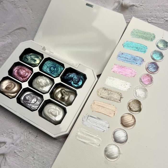 A collection of various colored and textured art gels displayed in a white palette, including putty-like gels in shades of pink, green, and silver that can be used for creating sculpted nail designs, extensions, and more. The gels appear to have excellent adhesion and firmness, making them suitable for a wide range of nail art and enhancement techniques.