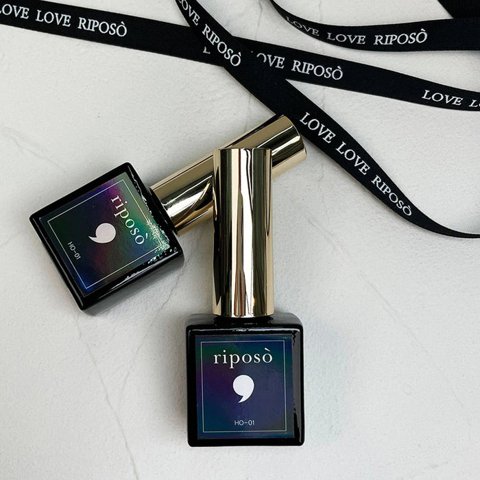 A colorful, holographic magnetic gel product called "RIPOSO Pulling Hologram HO-01" is displayed in the image. The product appears to be a unique holographic magnet gel from the Riposo brand, featuring a visually striking holographic effect that changes with the light. The image showcases the product's sleek, metallic packaging and the brand's distinctive "Love Riposo" logo.