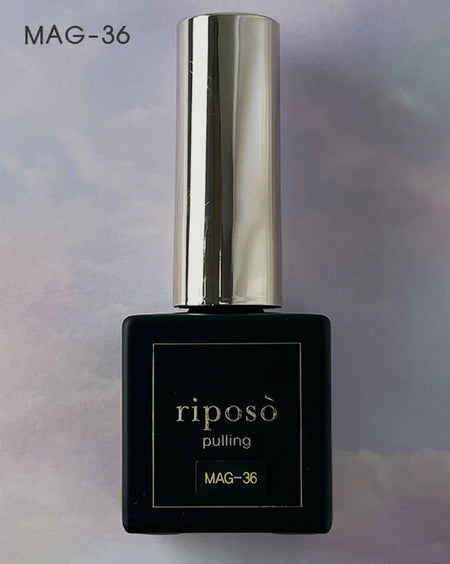 Transparent, layered magnet gel polish from the RIPOSO Pulling Collection, allowing for versatile and customizable nail designs. The non-wipe formula enables direct powder applications for a magical, mystical vibe. Includes a special heart charm for an added touch of charm.