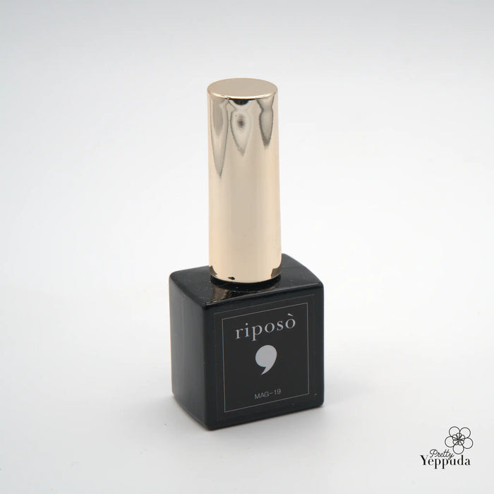 Elegant and sophisticated Riposo Autumn magnet gel set featuring 10 unique dual-toned shades, including a magnetic tool for artful application. The high-quality packaging and design showcase the brand's attention to detail and commitment to creating a premium nail care experience.