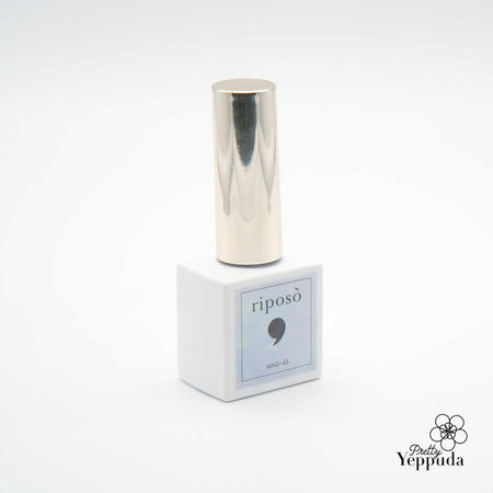 The image shows a bottle of the Riposo Pulling Jellybean Collection 10-piece magnetic nail polish set. The bottle has a sleek, metallic silver finish and is displayed on a white box with the Riposo brand name and product details. The image highlights the vibrant, pastel-colored magnetic gel polishes that can create a clear yet vivid magnetic look with just one or two coats, as described in the product description.