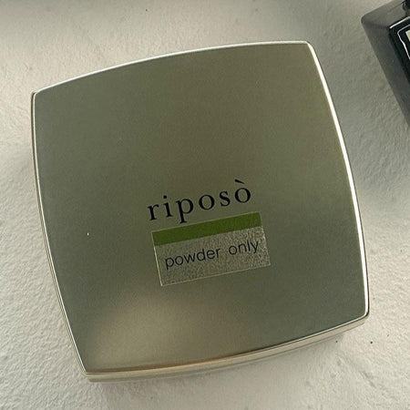 Long, elaborative alt text for the "RIPOSO Powder Only Gel (10g / 30g)" Shopify product image: This image showcases the Riposo brand's Powder Only Gel product, featuring its sleek, minimalist packaging design in a muted green color. The label prominently displays the Riposo brand name and the product descriptor "Powder Only Gel", indicating that this specialized gel is designed to enhance and support the application of powder nail formulations. T