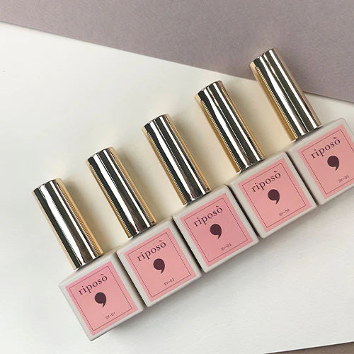 Elegant set of RIPOSO Love Love Syrup nail gel collection, featuring five shades of nude and sheer hues for a refined and natural look. The limited-edition set offers a luxurious, long-lasting gel formula with easy, one-step application. Ideal for creating a polished and sophisticated manicure.