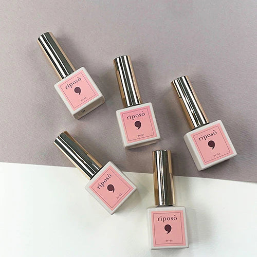 A set of five RIPOSO Love Love Syrup gel nail polish bottles in soft, pastel pink shades, with a clean, minimalist design and bold branding.