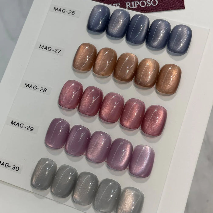 Elegant assortment of Pulling Gleam Silky Magnet Gel B Set featuring five shades in captivating fall/winter hues, providing a one-step solution for effortless powder nail art. The vibrant colors, smooth application, and magnetic properties of this RIPOSO product line showcase the brand's commitment to simplifying the nail care routine and embracing a radiant, effortless beauty.