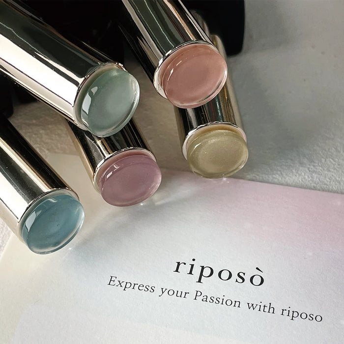 Colorful assortment of Riposo Pulling Gleam C nail polish set, featuring delicate pastel shades with pearlescent shimmer, perfect for the upcoming spring season.