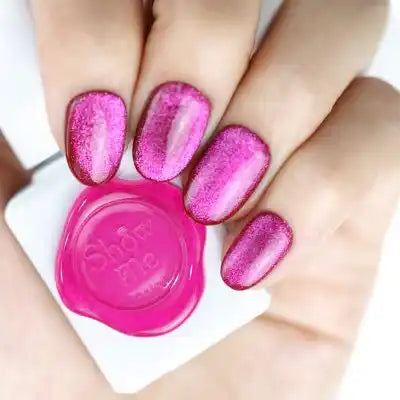 Vibrant fuchsia-pink gel nail polish bottles with a shimmering, glittery finish, showcasing the Cooing Prism Collection from SHOW ME KOREA brand. The multi-colored gel polish is perfect for creating saturated, rainbow-inspired nail art designs. The translucent bottle label adds a unique and visually striking element to the product.