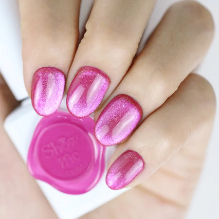 Vibrant pink cateye gel nail polish from the SHOW ME KOREA Cooing Punch Collection, featuring a bold, shimmering finish that adds a stylish punch to any nail art design.