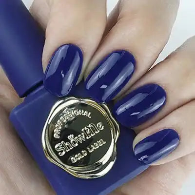 Elegant and sophisticated nail polish in deep navy blue hue from the Show Me Korea Edge Collection, showcasing a vibrant and long-lasting formula that provides full coverage in just one stroke. The neutral, classic color suits a variety of looks and occasions, making it a versatile choice for all nail enthusiasts.