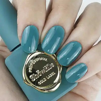 Exquisite teal-colored nail polish from the Show Me Korea Edge Collection, showcasing a vibrant, long-lasting hue that delivers superior pigmentation with just a single stroke. The premium formula provides a smooth, glossy finish for a professional manicure look.