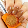 Festive glitter gel nail polish in a vibrant, golden hue that captivates the eye with its dazzling, firework-like sparkles. The Kitsch Collection by SHOW ME KOREA offers a must-have, high-shine nail product that is sure to elevate any beauty routine, whether applied as a full set or as a striking accent.