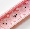 A pink nail tip stand set with five adorable bear-shaped holders, perfect for practicing and creating favorite nail designs with the Jin.B brand featured in the original pink packaging.