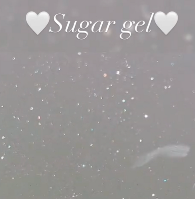 Sparkling and shimmering sugar gel product from the renowned Korean nail brand NAILBAYO, showcasing a glamorous and elegant look with its fine transparent glitter formula that is easy to apply even for beginners, delivering an exceptional self-leveling performance.