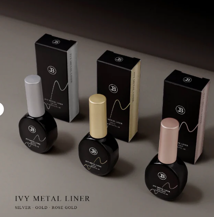 A close-up image of three bottles of JIN.B Ivy Metal Liner nail gel products in silver, gold, and rose gold shades, presented in sleek black and white packaging with the brand name prominently displayed.