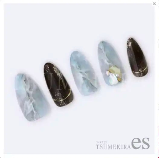 Detailed and artistic nails featuring a lightning and electrical design, with a white gradient background that allows for customization with color gels. The nails showcase the Tsumekira ES-YRK-002 THUNDER product, highlighting its versatility for turquoise crush parts and beautiful nail art designs. This Shopify product image showcases the high-quality and creative nail art solutions offered by the Tsumekira brand.