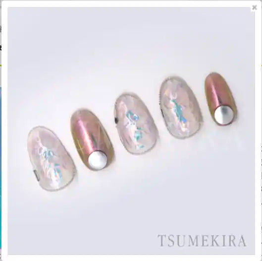 A vibrant, holographic nail art accessory featuring an array of iridescent hues and a captivating, Aurora-inspired design that creates a mesmerizing, shimmering effect when embedded and compressed, showcasing the innovative and high-quality products offered by the renowned Tsumekira brand.