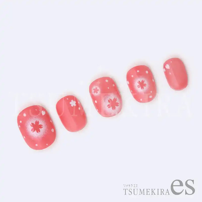 A close-up view of five pink acrylic nails adorned with delicate sakura flower decals and polka dot patterns, showcasing the Tsumekira AIRY CHEEK SAKURA ES-ACH-005 Shopify product's elegant and intricate nail art design.