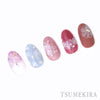 Elegant floral nail art designs featuring watercolor-style flowers in shades of pink and white, showcasing the high-quality Tsumekira nail art products.