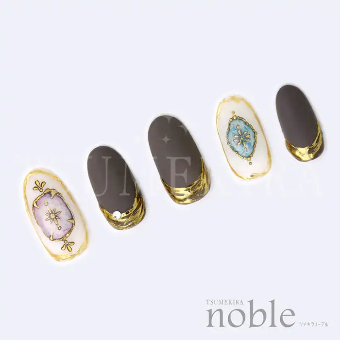 Decorative gold-edged nail art stickers featuring floral and celestial motifs, showcasing the elegant NOBLE JEWELRY collection from the Japanese brand Tsumekira, designed to elevate gel manicures with effortless jewel-like accents.