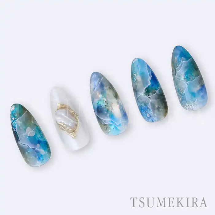 Intricately designed Tsumekira MAKI × ROND CRACK nail art stickers featuring a stunning natural stone crack pattern in shades of blue, green, and white, perfect for creating a captivating and unique manicure.