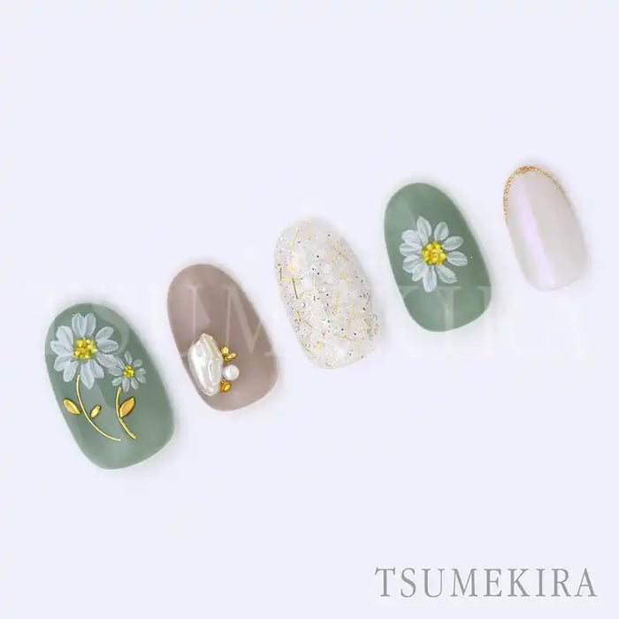 White and yellow floral nail art designs featuring the TSUMEKIRA brand. The nail designs showcase intricate and delicate flower motifs in shades of green and cream, adding a touch of elegance and sophistication to the Shopify product "Tsumekira YUMI × MAGARET NN-YMI-001". The nail art showcases the brand's attention to detail and Japanese-inspired aesthetic, making it an appealing option for those seeking high-quality nail art products.