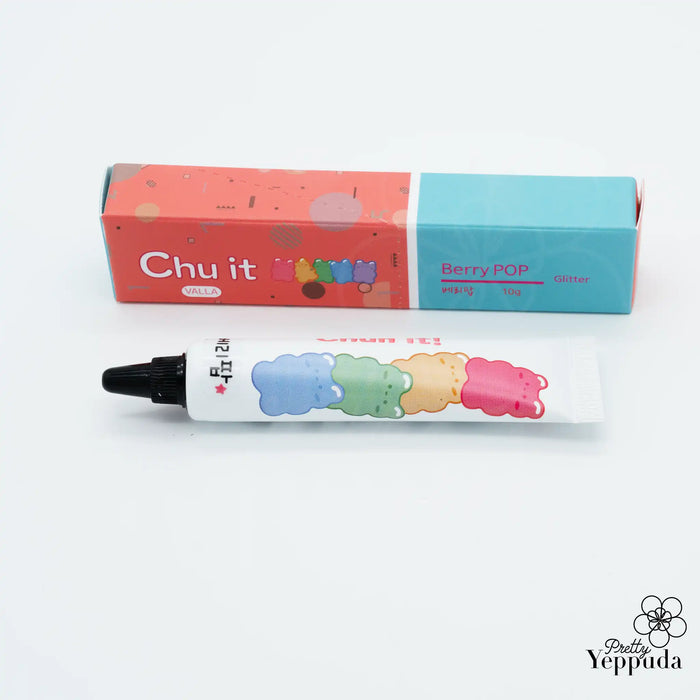 A vibrant and colorful image showcasing a Shopify product called "VALLA Chu It 3D Deco Gel Set" by the brand VALLA. The product appears to be a set of 3D deco tube gels in various shades, including peach, neon pink, lime, neon lime, carrot, neon orange, berry, fruity, candy, and unicorn pop. The gels come in a compact, eye-catching packaging that highlights the product's key features and benefits.