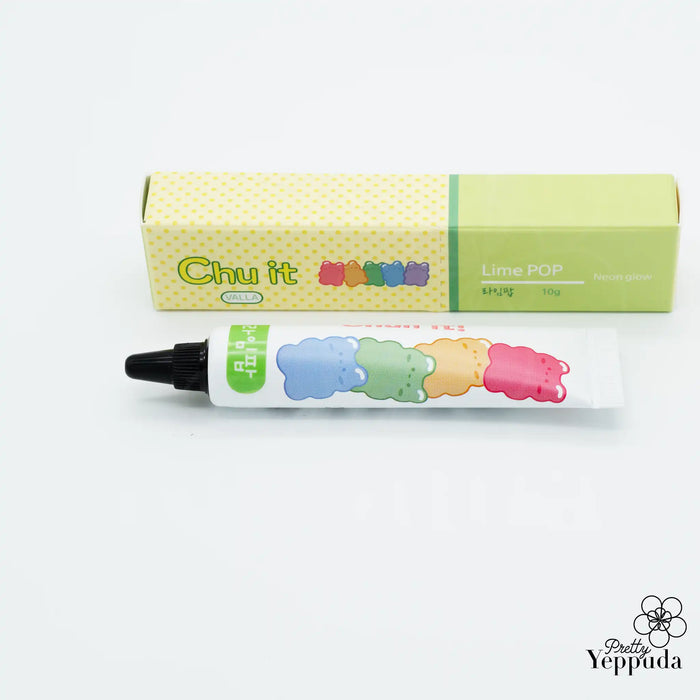 Elaborative ALT text: A colorful set of 3D deco tube gels from the VALLA Chu It product line. The set includes 4 glitter tube gels and 3 neon glow-in-the-dark tube gels in vibrant shades like Peach Pop, Neon Pink, Lime Pop, Neon Lime, Carrot Pop, Neon Orange, Berry Pop, Fruity Pop, Candy Pop, and Unicorn Pop. The product is packaged in a bright, polka-dot box, showcasing the unique and playful nature of these fun, decorative nail gels.