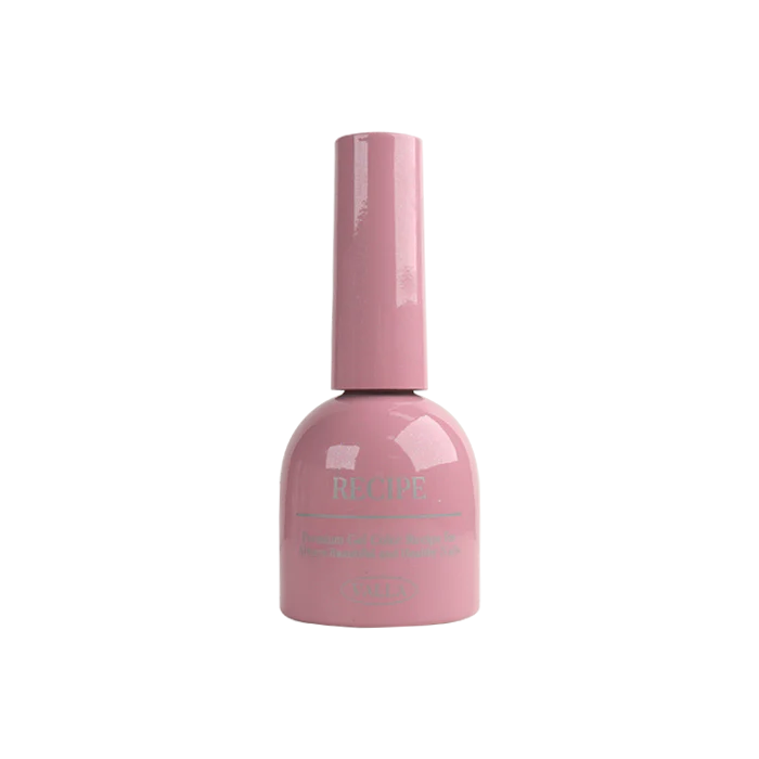 A polished, glossy nail polish bottle in a soft, pastel pink shade, part of the VALLA Dewy Collection. The bottle features a cylindrical design with a smooth, reflective surface, capturing the essence of the brand's "silky effect" and "high quality smooth cat eye" formulation.