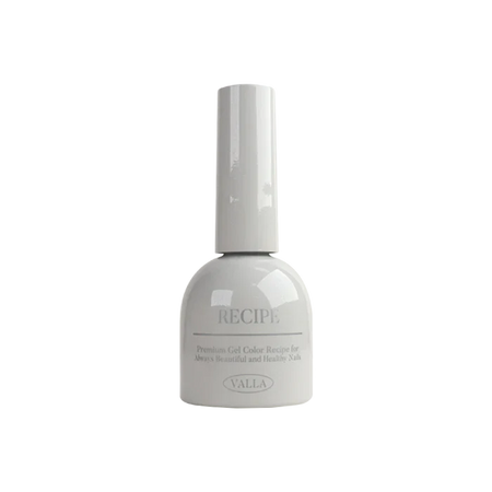 A polished, glossy nail polish bottle in a soft, pastel pink shade, part of the VALLA Dewy Collection. The bottle features a cylindrical design with a smooth, reflective surface, capturing the essence of the brand's "silky effect" and "high quality smooth cat eye" formulation.