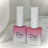 Two bottles of Korean nail polish in shades of pink, including "Doi Tint Pink" and "Doi Tint Coral", showcasing the Nailbayo brand's high-quality, buildable gel formulas that provide an excellent self-leveling application, making them user-friendly even for beginners.