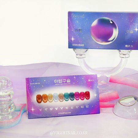 Captivating multicolored beads set against a vibrant, galactic backdrop, showcasing the Yogurt Magic Beads Collection - a mesmerizing array of 10 unique shades designed for 60s UV/LED curing. This stunning Shopify product offers a magical, space-inspired palette for Yogurt customers seeking a touch of celestial enchantment in their nail art creations.