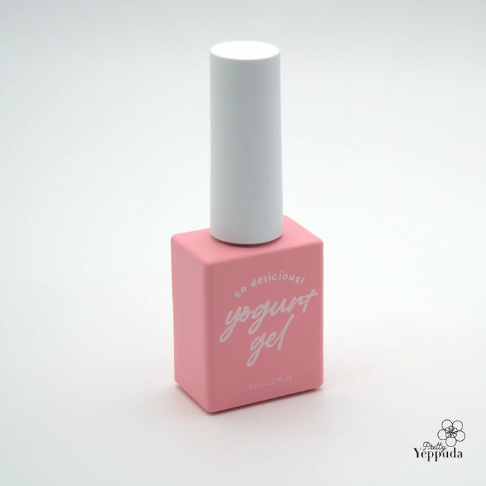 Detailed image of a pink and white yogurt-themed cosmetic product with a unique bottle design, showcasing the high-quality and appealing nature of the Yippuda brand.