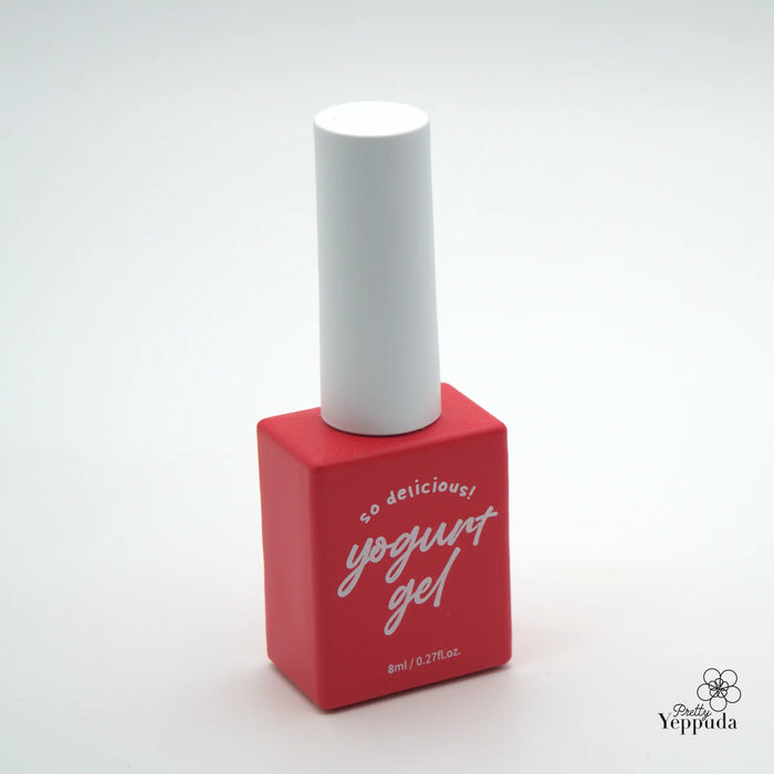 A minimalistic image of a red polish bottle featuring the Yogurt gel brand name, showcasing a simple yet stylish design that highlights the product's key features.