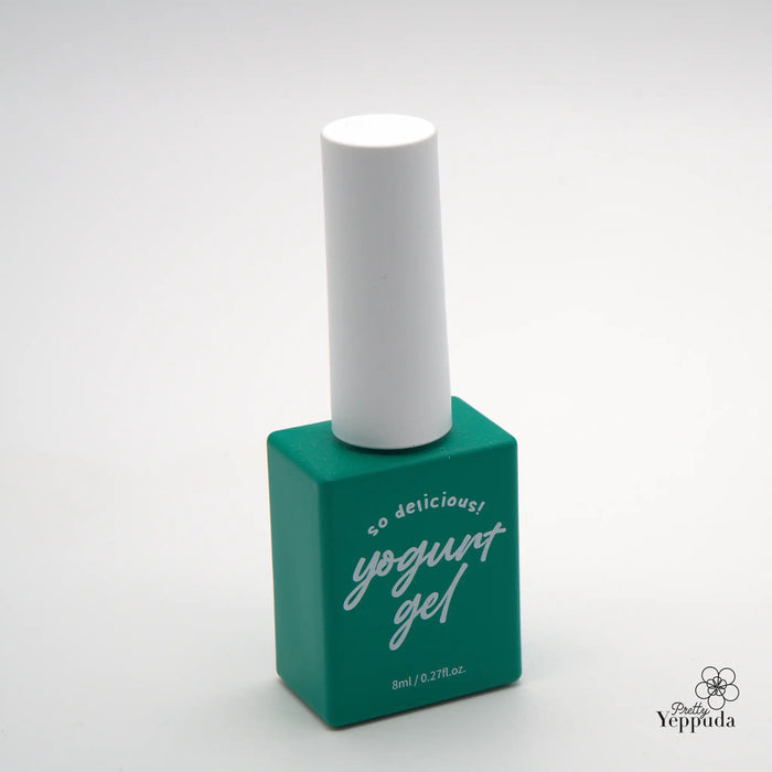 Vibrant green nail polish container with a white cap, showcasing a product titled "YOGURT Grocery set 90 colors" from the Yoppuda brand. The image highlights the stylish and eye-catching design of this cosmetic item, making it an appealing option for those seeking a high-quality, versatile nail care solution.