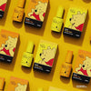 Vibrant image showcasing DGEL Disney Honey Base Gel 18 ml bottles, featuring Winnie the Pooh's iconic character design. The product appears to be a high-quality, user-friendly nail gel with a non-wipe, honey-textured formula. This base gel prepares the nail for color application and promotes healthier, stronger nails for an extended manicure life, making it a popular choice among nail stylists.