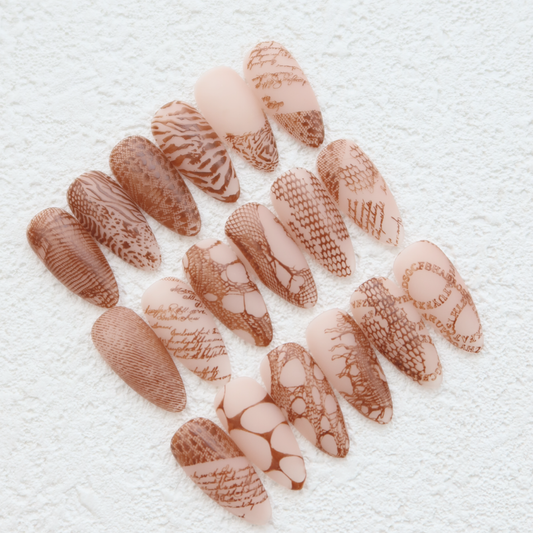 FIOTE Pattern Layer Stamping Plate — square nail-art examples; gel colours and stamping accessories sold separately.