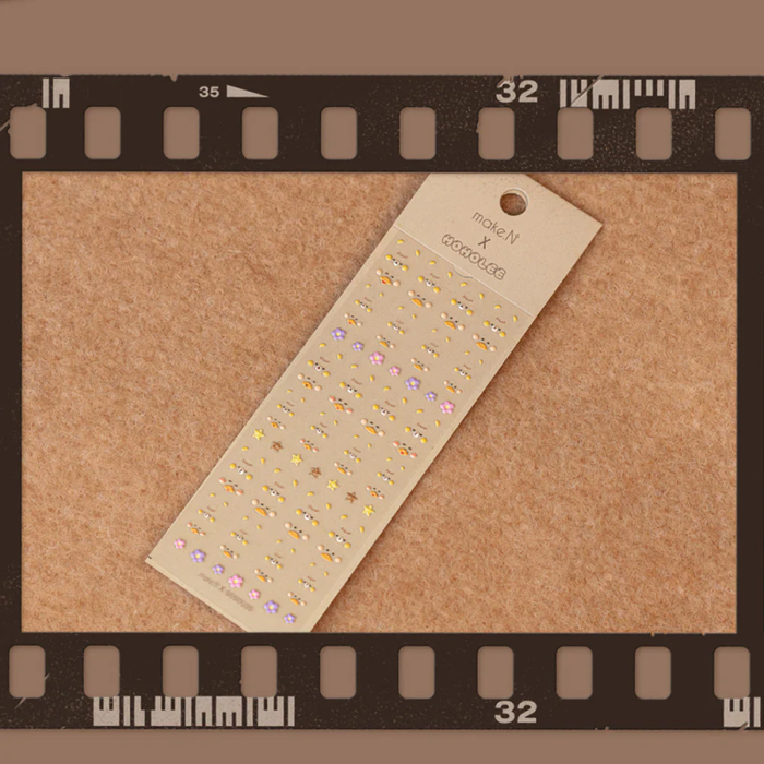 Decorative charms and stickers in whimsical HoHo and RiRi designs, offering a delightful way to elevate your nail art and accessories with a touch of irresistible charm. The pack includes 5 3D charms and a sticker sheet featuring various facial expressions inspired by the HoHo and RiRi characters.